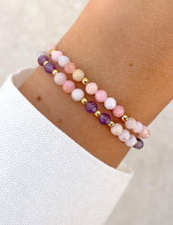 Bracelet on an elastic band with khaki cubic zirconia and natural pearl