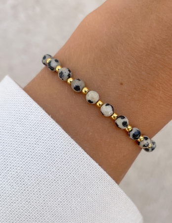 Bransoletka na gumce z jaspisu dalmatyńskiego z hematytem - odwaga, bogactwo, spokój