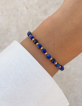 Bransoletka na gumce z lapis lazuli z hematytem - szczęście, dobrobyt, mądrość i odwaga