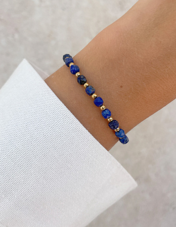 Bransoletka na gumce z lapis lazuli z hematytem - szczęście, dobrobyt, mądrość i odwaga