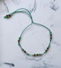 Bracelet natural zoisite stones with ruby, spinel, silk thread
