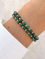 Bracelet on an elastic band with khaki cubic zirconia and natural pearl