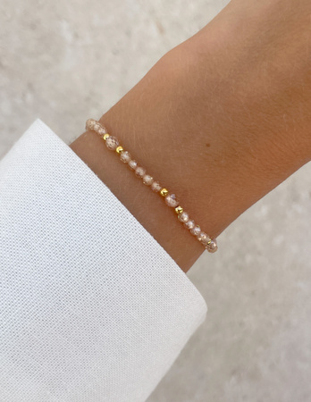 Bransoletka na gumce z cyrkonii szampańskiej z hematytem - ochrona, miłość, dostatek