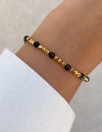 Bransoletka na gumce z czarnego turmalinu z hematytem - ochrona, odwaga, pamięć