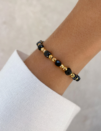 Bransoletka na gumce z czarnego turmalinu z hematytem - ochrona, odwaga, pamięć