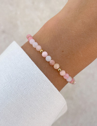 Bracelet on an elastic band with khaki cubic zirconia and natural pearl