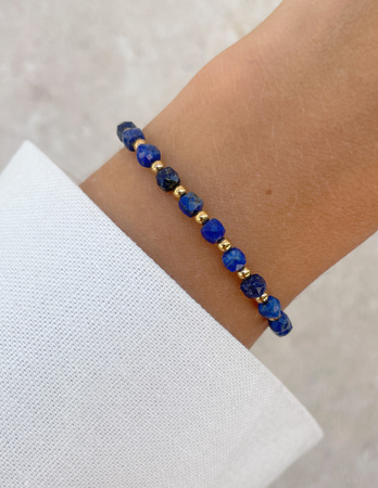 Bransoletka na gumce z lapis lazuli z hematytem - szczęście, dobrobyt, mądrość i odwaga