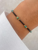 Bransoletka na nici z czarnym turmalinem i turkusem - ochrona, relacje, kreatywność