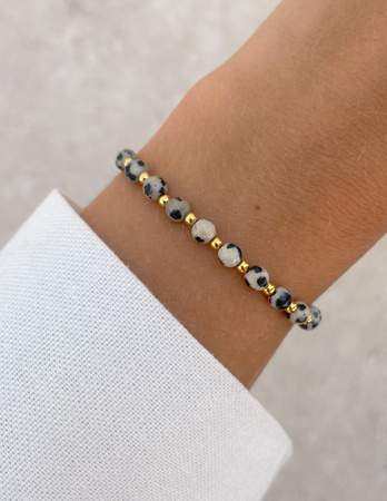 Bransoletka na gumce z jaspisu dalmatyńskiego z hematytem - odwaga, bogactwo, spokój