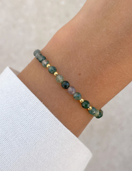 Bracelet on an elastic band with khaki cubic zirconia and natural pearl
