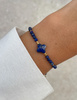Bransoletka na nici z lapisu lazuli z koniczyną - inspiracja, mądrość, prawda