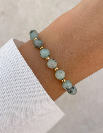 Bransoletka na gumce z jaspisu kiwi z hematytem - ochrona, harmonia, witalność