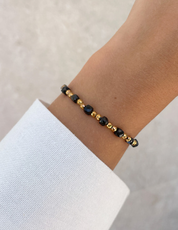 Bransoletka na gumce z czarnego turmalinu z hematytem - ochrona, odwaga, pamięć