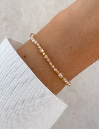 Bransoletka na gumce z cyrkonii szampańskiej z hematytem - ochrona, miłość, dostatek