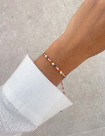 Bransoletka na nici z cyrkonii z perełką Lea - pewność siebie, dobrobyt, ochrona