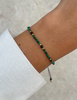 Bransoletka na nici z czarnym turmalinem i malachitem - ochrona, odwaga, determinacja