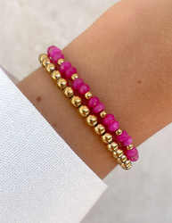 Bracelet on an elastic band with khaki cubic zirconia and natural pearl