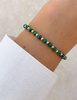 Bransoletka na gumce z malachitu z hematytem - obfitość,  optymizm, spokojny sen