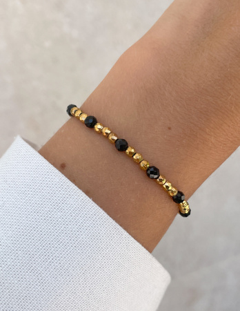 Bransoletka na gumce z czarnego turmalinu z hematytem - ochrona, odwaga, pamięć