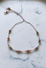 Bracelet natural stones rhodonite silk thread
