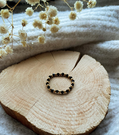 Elastic black spinel ring with gold-plated balls
