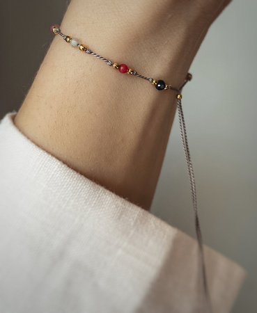 Bracelet with the zodiac sign Libra with gold-plated balls