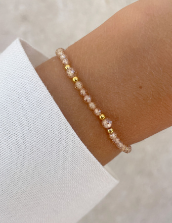 Bransoletka na gumce z cyrkonii szampańskiej z hematytem - ochrona, miłość, dostatek