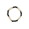 Elastic ring with natural spinel stones and pearls